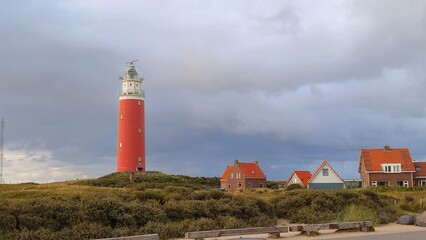 lighthouse on the shore of the sea