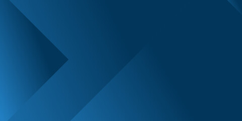 Obraz premium a solid blue background with a few dark blue shapes.