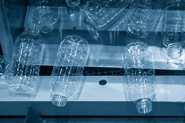 The pile s of PET drinking water bottle.