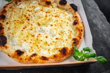 pizza cheese mozzarella, blue cheese, camembert and cheddar fresh meal food snack on the table copy space food background rustic top view