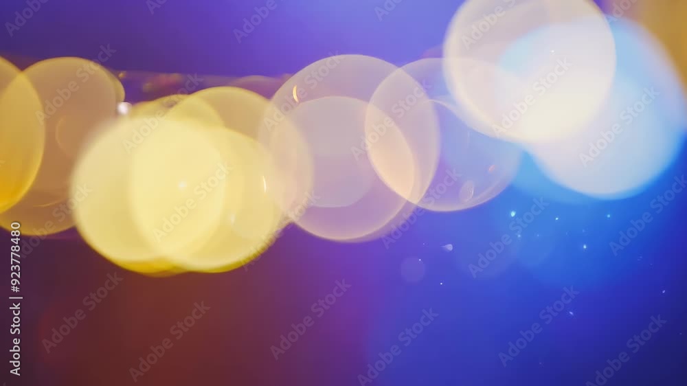 Poster blurred lights in bokeh abstract effect on dark background