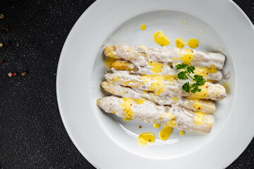 asparagus white in cream sauce fresh food snack on the table copy space food background rustic top view