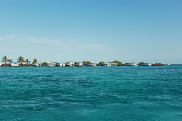 Breathtaking Serene of Maldives Coastal View of Charming Beachfront Boats 