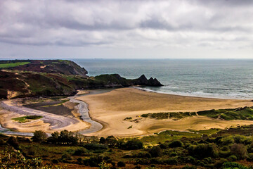 Three cliffs bay in southern Wales on an overcast Autumn Day.