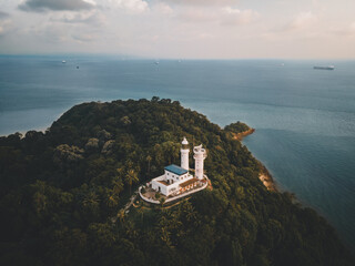 Cape Rachado Lighthouse, Malaysia's oldest, sits atop a wooded hill in Port Dickson. The 16th century, it offers scenic sea views, birdwatching, and trails through the lush Tanjung Tuan Reserve.