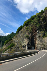 Transfagarasan in Romania. Summer mountain road. Mountain tunnel. 