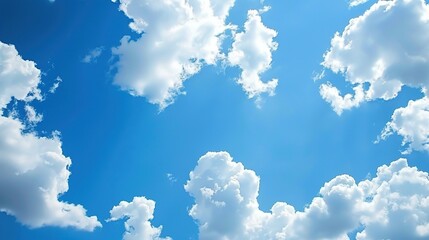 Expansive Blue Sky with Puffy White Clouds: A Serene Natural Backdrop for Inspiring Scenes