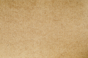 Macro grains kraft brown paper with scratches texture