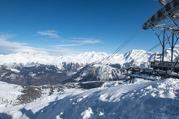 At the top of the Saulire Express ski lift above Meribel and Courchevel in the French Alps in winter