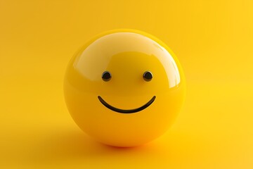 Fototapeta premium A bright yellow 3D smiling face ball against a matching yellow background, radiating positivity and happiness.