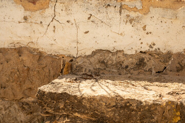 Timeworn textures of a crumbling wall