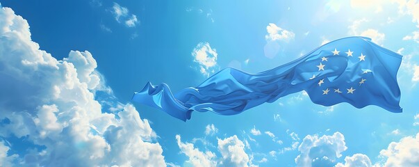 European Union Flag Waving Against Blue Sky and Clouds