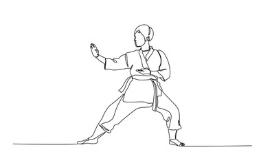 One continuous line drawing karateka fighter in kimono practicing karate kick combat. Karateka sport single line illustration.