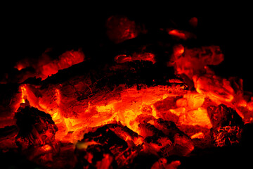 Bonfire burning in a campsite, texture close-up.