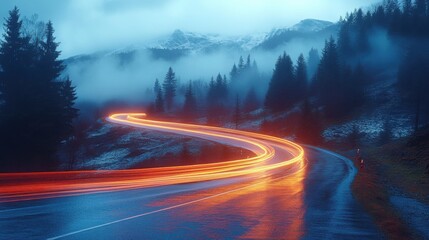 A misty mountain road with a glowing, serpentine trail of lights cutting through the foggy twilight landscape.

