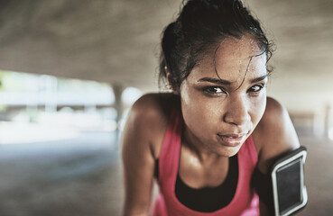 Woman, portrait and runner sweating in outdoor, cardio break and wet from workout training. Female...
