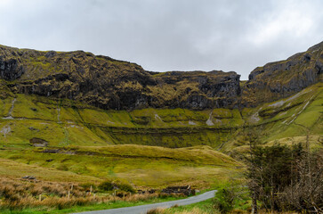 Fototapeta premium Landscape of Gleniff Horseshoe valley in County Sligo with road as a leading line into the scene