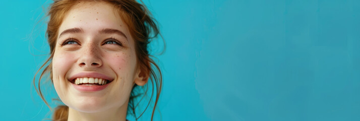 banner, portrait of a young African American woman doctor in a white coat, smiling brunette doctor, blue background, poster, copy space, free space for text
