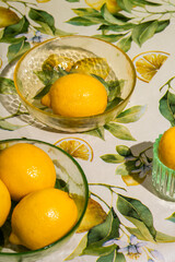 Fresh Lemons on White Background with Patterned Tablecloth