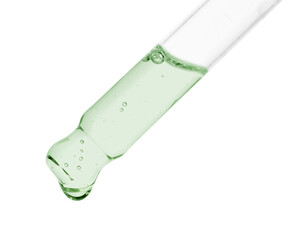 Dropper with green cosmetic oil on white background