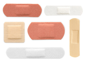 Many different medical plasters isolated on white, set