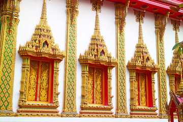 Fantastic Ornated Windows of Buddhist Temple Ordination Hall in Thailand