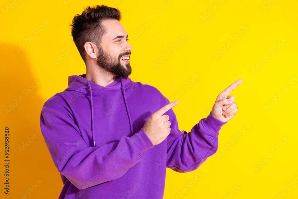 Sticker Photo of attractive nice man wear violet stylish clothes recommend blank space isolated on yellow color background