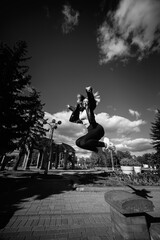 Portrait of a young beautiful short-haired girl in an urban environment.