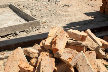 Pile of a bricks on ground