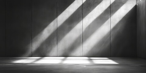 Obraz premium This setting features a minimalist design with a sleek concrete wall and floor, enhanced by dramatic lighting and shadows, ideal for striking product displays and engaging presentations