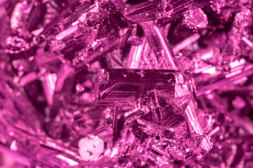 Amethyst pink crystals. Gems. Mineral crystals in the natural environment. Texture of precious and semiprecious stones. Seamless background with copy space colored shiny surface of precious stones.