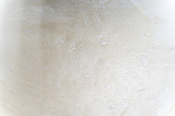 Background, texture of rolled dough for making pizza or flour products.