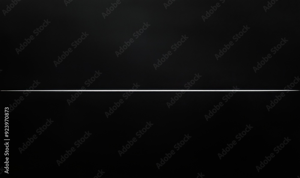 Poster a long, thin object is shown in a black background. the object is silver and he is a wire. the image