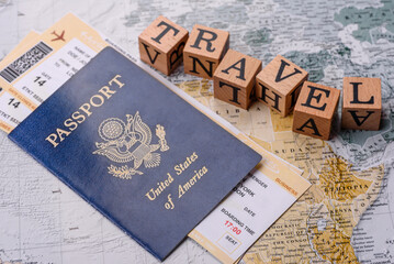 Conceptual background for travel with passport, magnifying glass, world map and money