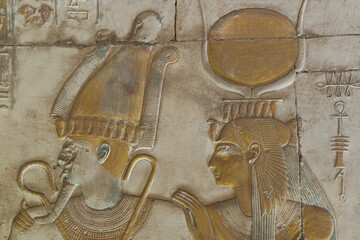 Hathor standing behind Osiris at Abydos Temple. Egypt.
