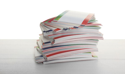 Stack of business cards on table against white background