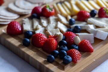close up of fruit and cheese selection