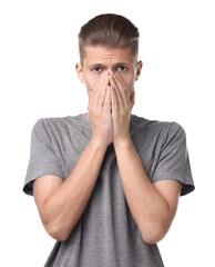 Young man suffering from sinusitis on white background