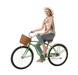 Smiling woman on bicycle with basket against white background