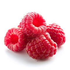 Vibrant red raspberries rest together on bright white background, showcasing fresh appearance