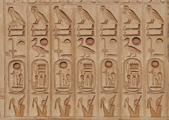 Relief with hieroglyphs and the cartouches of Ramesses II. in Abydos Temple . Abydos . Egypt .