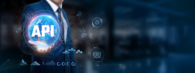 Businessman holds global network structure integrating APIs for seamless communication, data...