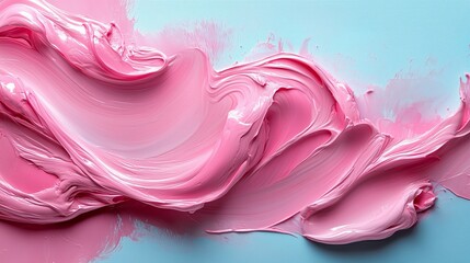Obraz premium Swirling pink paint on a light blue background with smooth texture and vibrant color blending