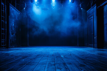 An empty stage with modern dance performance setup, illuminated by blue and green stage lighting. The scene is set for an entertainment show, featuring contemporary dance