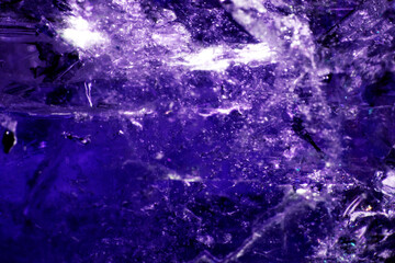 Close Up of a Rock Crystal with inclusions in Putple blue Rainbow