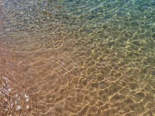 Sea crystal clear water on sandy beach