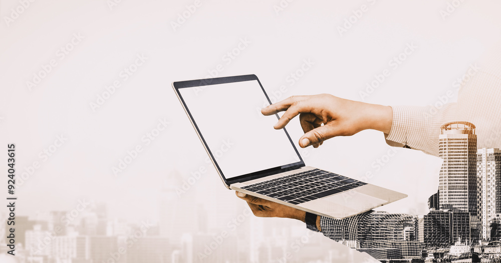 Poster double exposure image of businessman using computer on abstract modern city background. future busin
