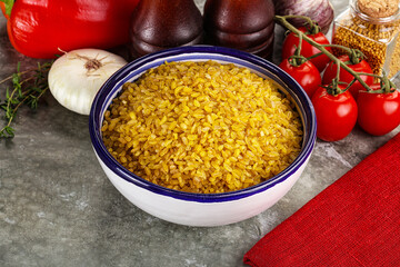 Dry wheat bulgur cereal heap