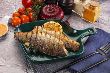 Grilled seabass fillet with lemon