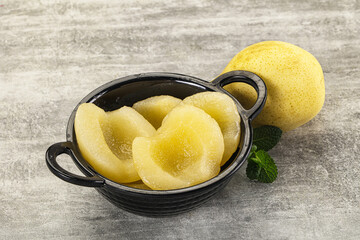 Canned yellow pear with syrup